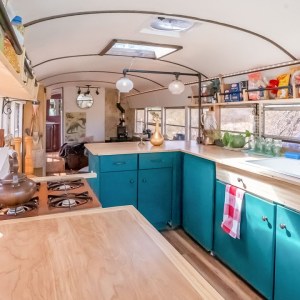 DIY 36ft. Budget Skoolie w/ Murphy Bed, Skylights & Unique Large Workshop