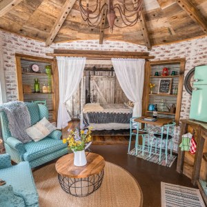 Rustic Silo Turned Tiny Home Surrounded by Nature