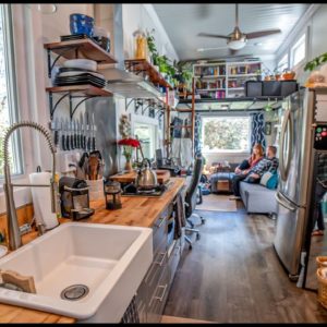 Their Gorgeous DIY Tiny Home With Bathtub, Full Size Fridge And Ample Storage